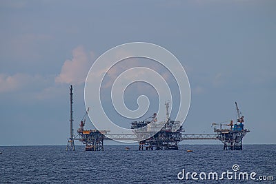 Oil refinery platform at the open sea, producing black gold Editorial Stock Photo