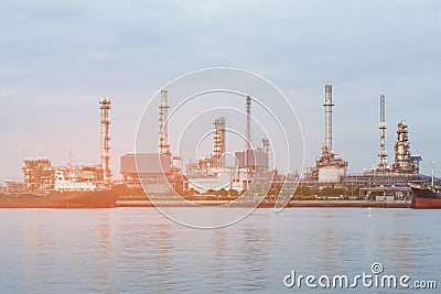 Oil refinery river front Stock Photo