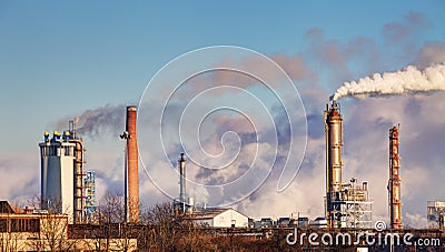 Oil refinery with vapor - petrochemical industry Stock Photo