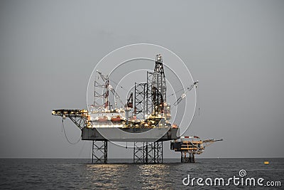 Oil and rig platform operation in north sea, Heavy industry in oil and gas business in offshore, rig operation Stock Photo