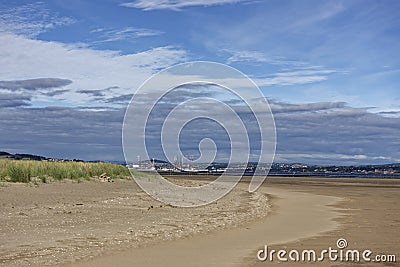 Oil Rigs in for a Refit at the Port of Dundee seen from Tentsmuir Point on the south side of the Tay estuary. Stock Photo