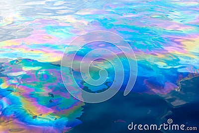 Oil slick creates Rainbow Colors on Water Stock Photo