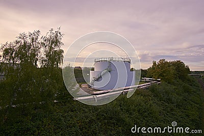 A oil tank and rails Stock Photo