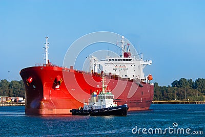 Oil tanker and a tugboat Stock Photo