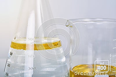 Oil in water emulsions, Oil mixing in liquid phase, Science laboratory, Chemical substance in cylinder Stock Photo