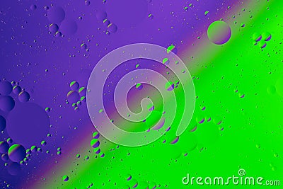 Oil on water flat colorful duotone macro abstract background photographic image. Stock Photo