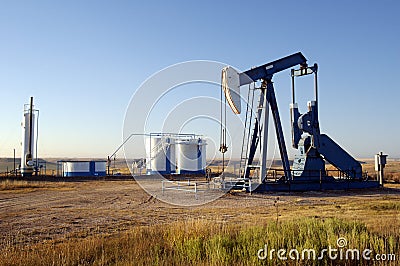 Oil well and Storage Tanks Stock Photo