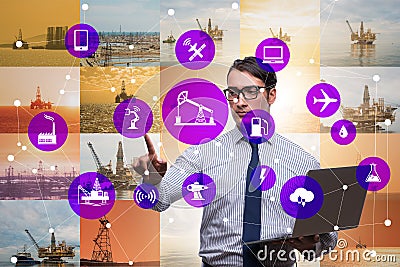 Oil worker in remote operations concept in oil industry Stock Photo