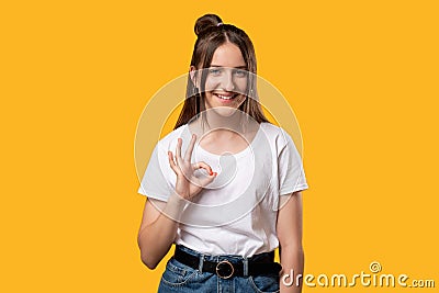 Ok gesture approval sign happy woman showing yes Stock Photo