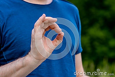 OK perfect sign with hand - young male person Stock Photo