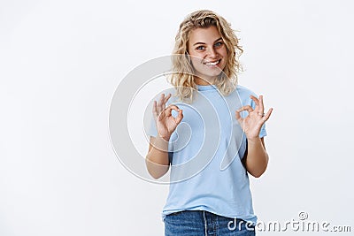 Okay no probem, count on me. Portrait of charismatic assured and assertive helpful female friend showin ok gestures with Stock Photo