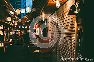 Night view of Japanese food stalls Yatai street in Okinawa Editorial Stock Photo