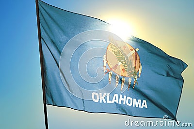 Oklahoma state of United States flag waving on the wind Stock Photo