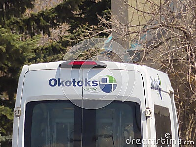 A close up to an Okotoks Public transit van Editorial Stock Photo