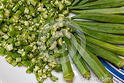 Okra, Okro Ila freshly rinsed and diced and ready for use Stock Photo