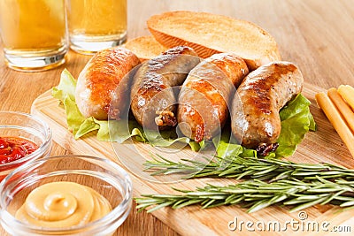 Oktoberfest traditional beer menu. Fried sausages with toast and mustard. Stock Photo