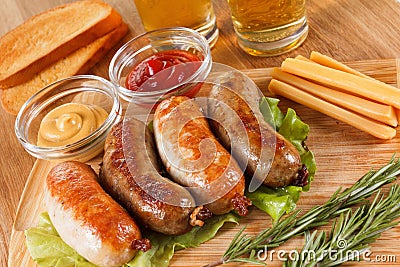 Oktoberfest traditional beer menu. Fried sausages with toast and mustard. Stock Photo