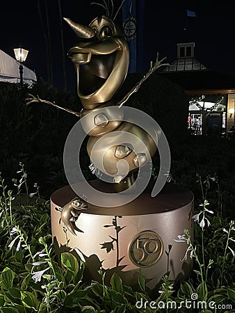 Olaf`s Disney World 50th Anniversary Statue inside Epcot in Orlando, Florida Editorial Stock Photo