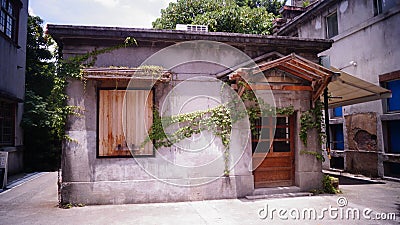 Old abandoned closed market with wooden door and window Stock Photo