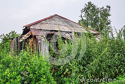 An old abandoned country house. Boltovo Village, Western Siberia Editorial Stock Photo