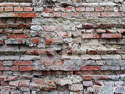 Old abandoned cracked brick wall Stock Photo