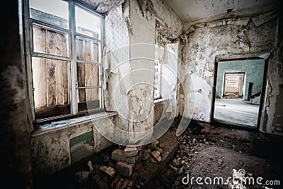 Old abandoned creepy manor house room Stock Photo