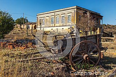 Old abandoned farm house in Brazil with cart load Stock Photo