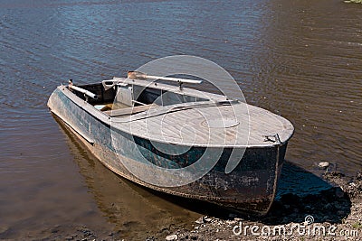 Old abandoned fishing boat Stock Photo