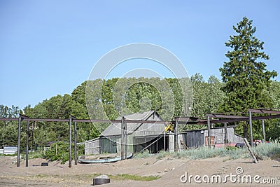 An old abandoned fishing village, a pier and a Telfer for launching boats. Stock Photo