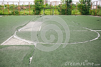 Old abandoned football pitch. Urban photo of destruction Stock Photo