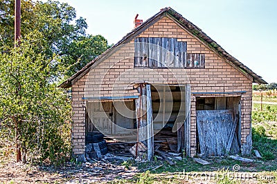 Old abandoned garage in disrepair Stock Photo