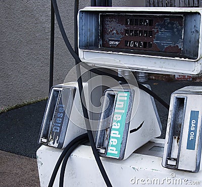 Old abandoned gas pump at a derelict service station Editorial Stock Photo