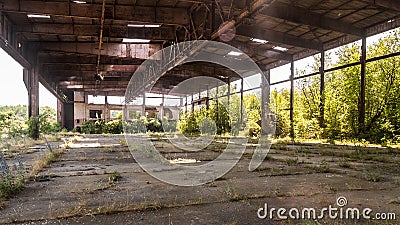 Old abandoned hangar of the military airbase Stock Photo