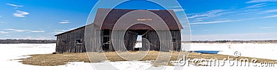 Old abandoned rusted barn Stock Photo