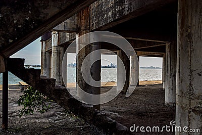 Old abandoned structure, rust stains, decayed stairs in Pattaya, Thailand Stock Photo