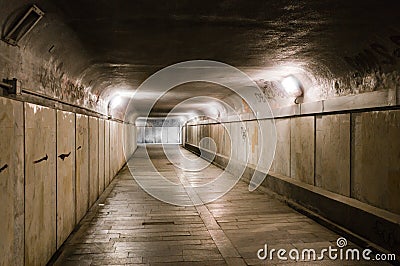 Old abandoned underground tunnel Stock Photo