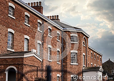 Old abandoned Victorian workhouse with dramatic sky Stock Photo