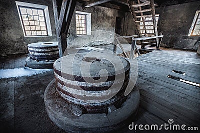 Old abandoned watermill interior Stock Photo