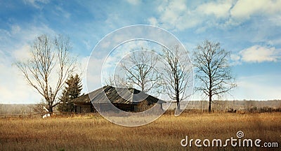 Old abandoned wooden house in the village Stock Photo