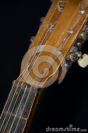 Old Acoustic Guitar Strings, Fretboard, Nut & Machine Head Detail Stock Photo