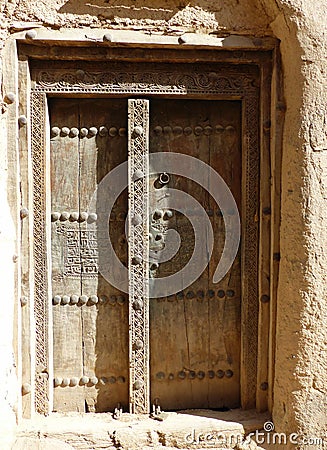 Doorway in the part-ruined village of Al Hamra in Oman Stock Photo