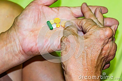 Old age and illnesses of pharmaceutical medicament severe gout in men suffering from joint pain, bone pain, gout ,arthritis ,arm, Stock Photo