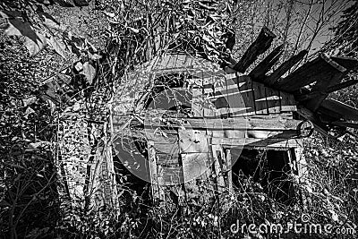 Black and white of old damaged wooden house Stock Photo
