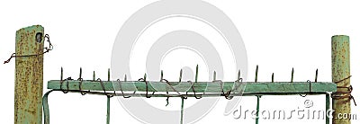 Old aged weathered green painted metallic vintage fence gate large detailed upward driven security nails closeup panorama isolated Stock Photo