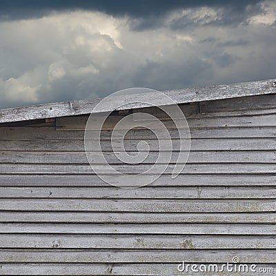 Old aged weathered natural grey damaged wooden farm shack wall texture, large detailed textured rustic grungy vertical background Stock Photo