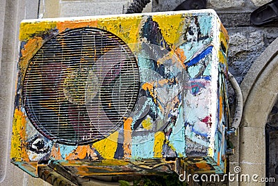 Old air conditioner with street drawings Stock Photo