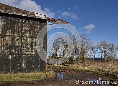 An Old Aircraft Hangar, now being used as a Farmers Store at the Old Condor Airfield. Stock Photo