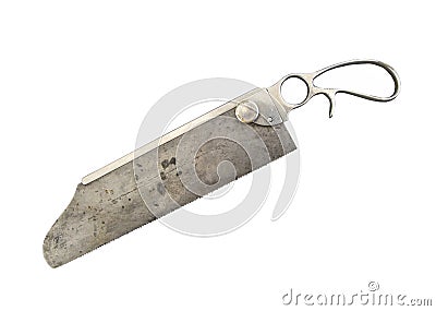 Old amputation bone saw isolated. Stock Photo