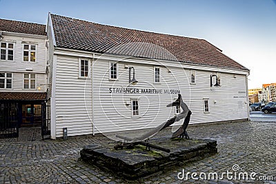 An old anchor displayed in front of Stavanger Maritime Museum entrance Editorial Stock Photo