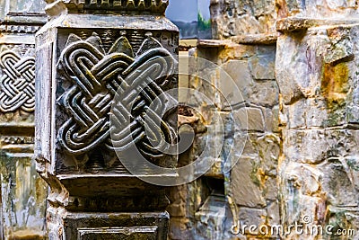 Old ancient looking celtic stone pillar, prehistoric architecture background Stock Photo